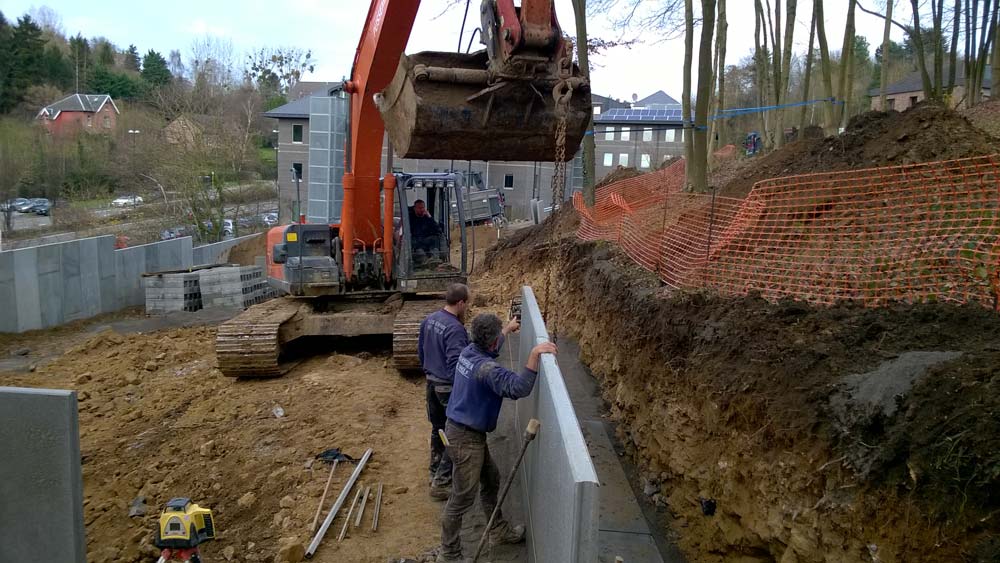 Pose de L béton sur une chape en béton maigre